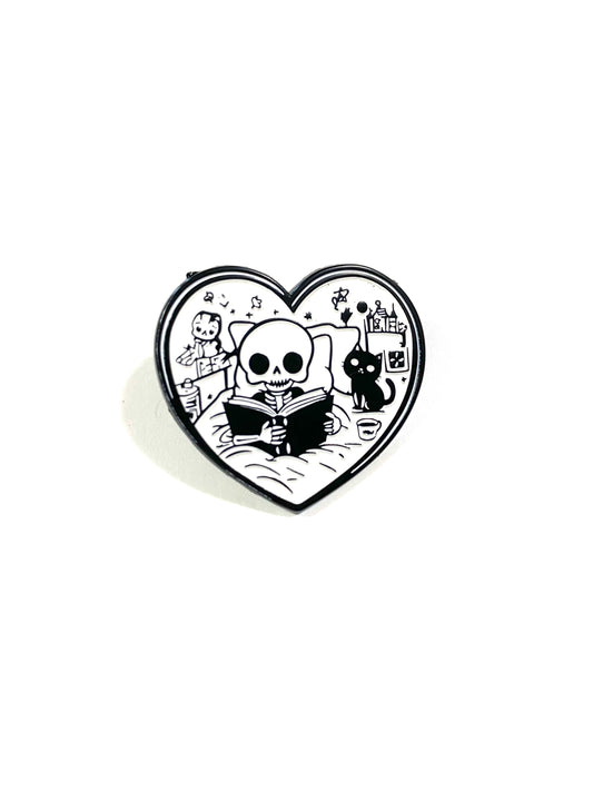 Skeleton Reading Heart pin (black book)