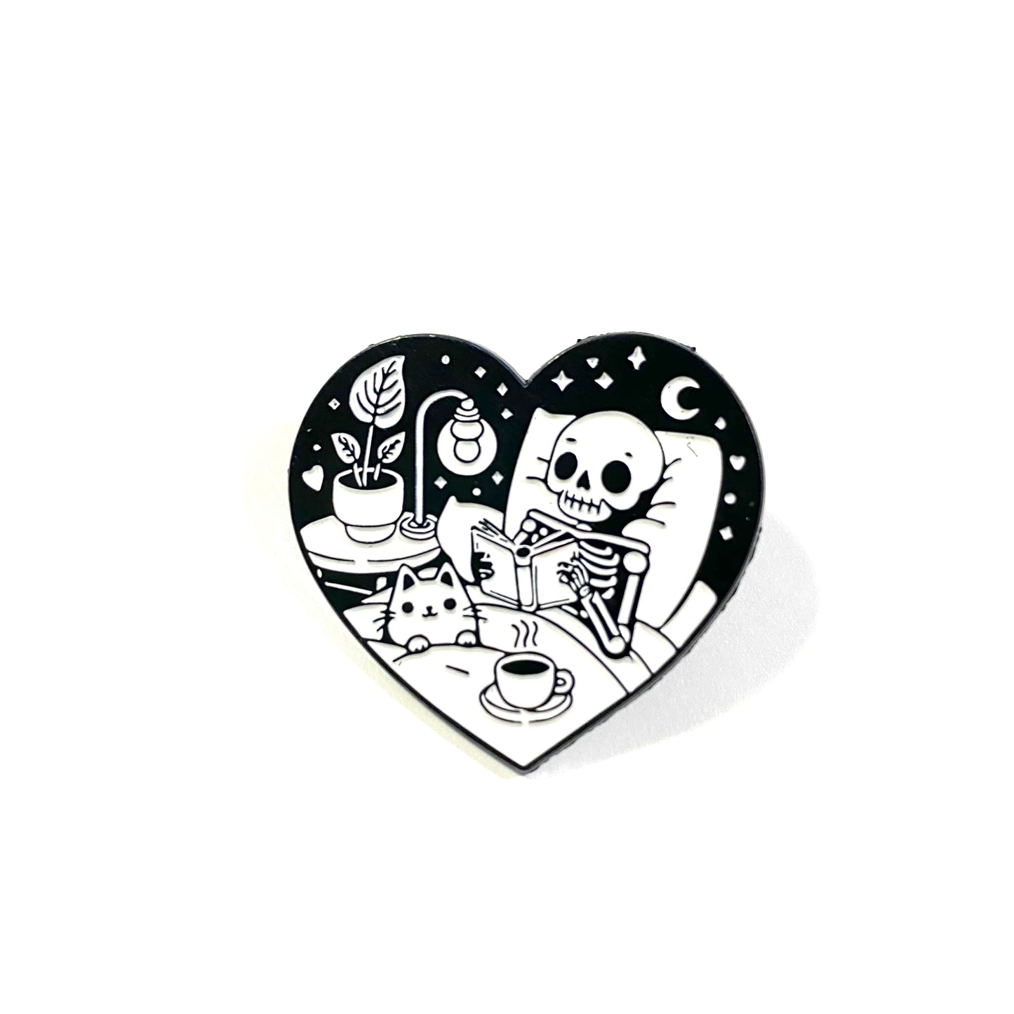 Skeleton Reading Heart pin (black background)